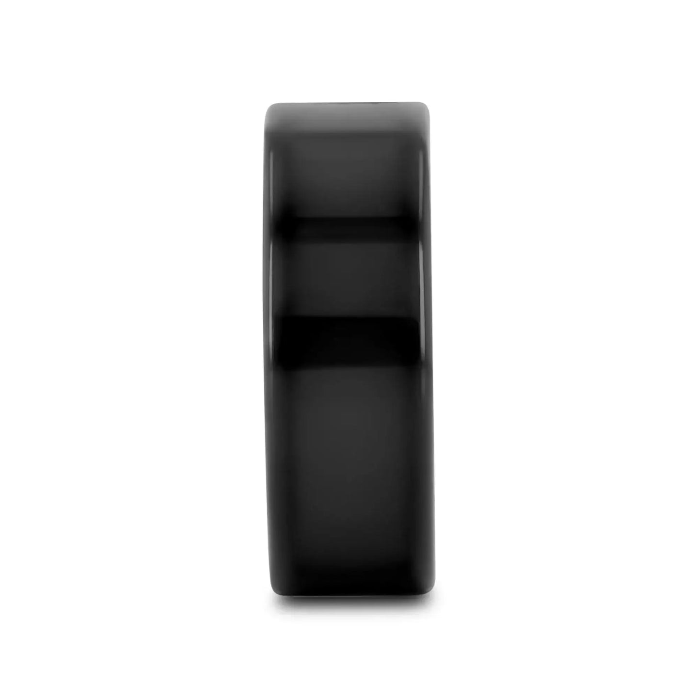 Angled view showing the flat profile and polished black finish of the tungsten ring