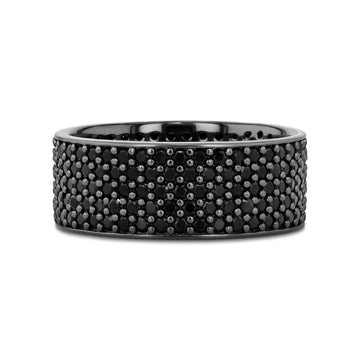 Side profile of the wide pavé black spinel wedding band