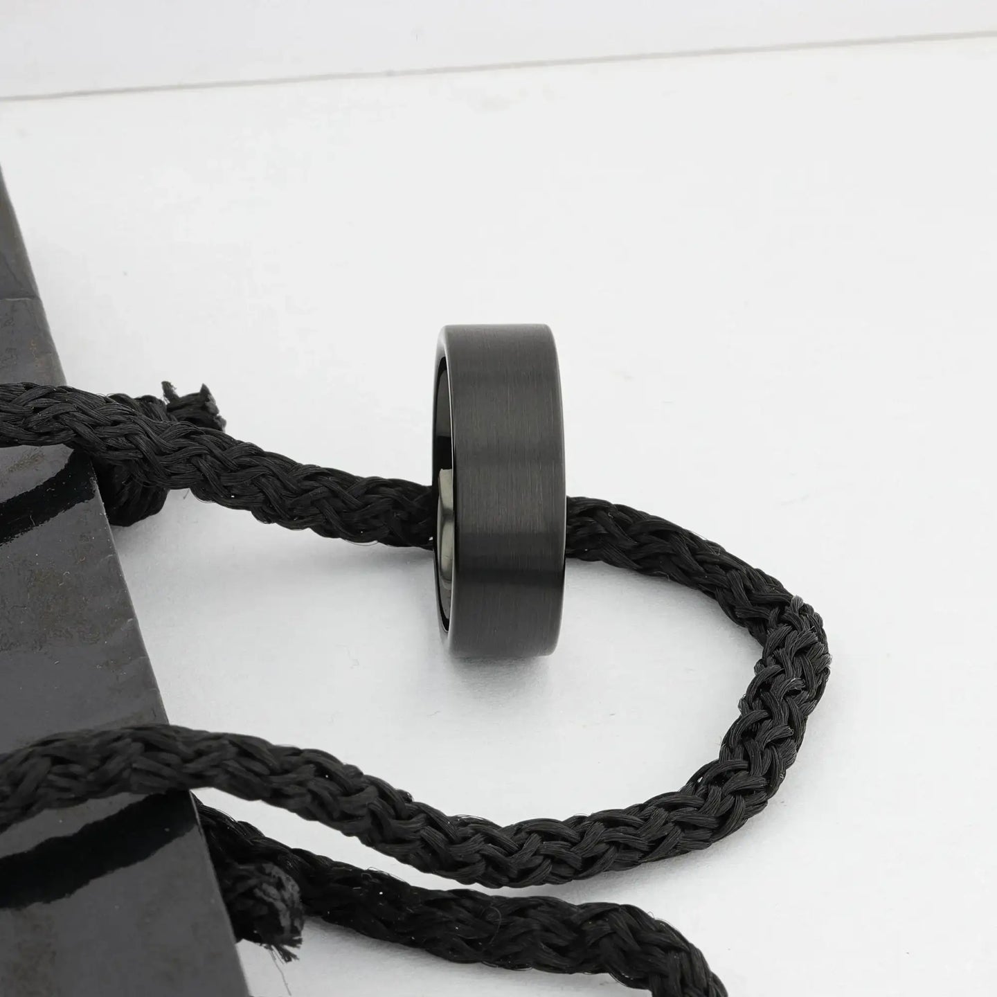 SAN ANTONIO black brushed tungsten carbide band shown on a hand