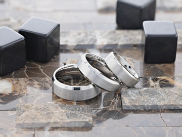 Close-up studio shot of SHIRE titanium band showing beveled edges