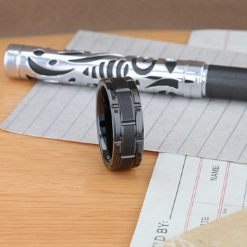 WINDSOR ring standing upright on a desk scene with a pen in the background