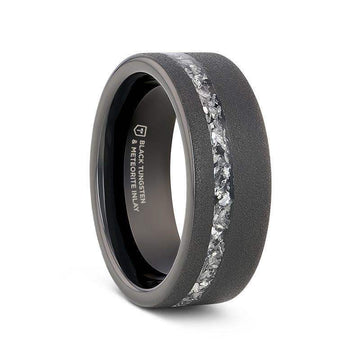 Side view of ABYSS sandblasted black tungsten ring featuring a central meteorite fragments inlay, 8mm width