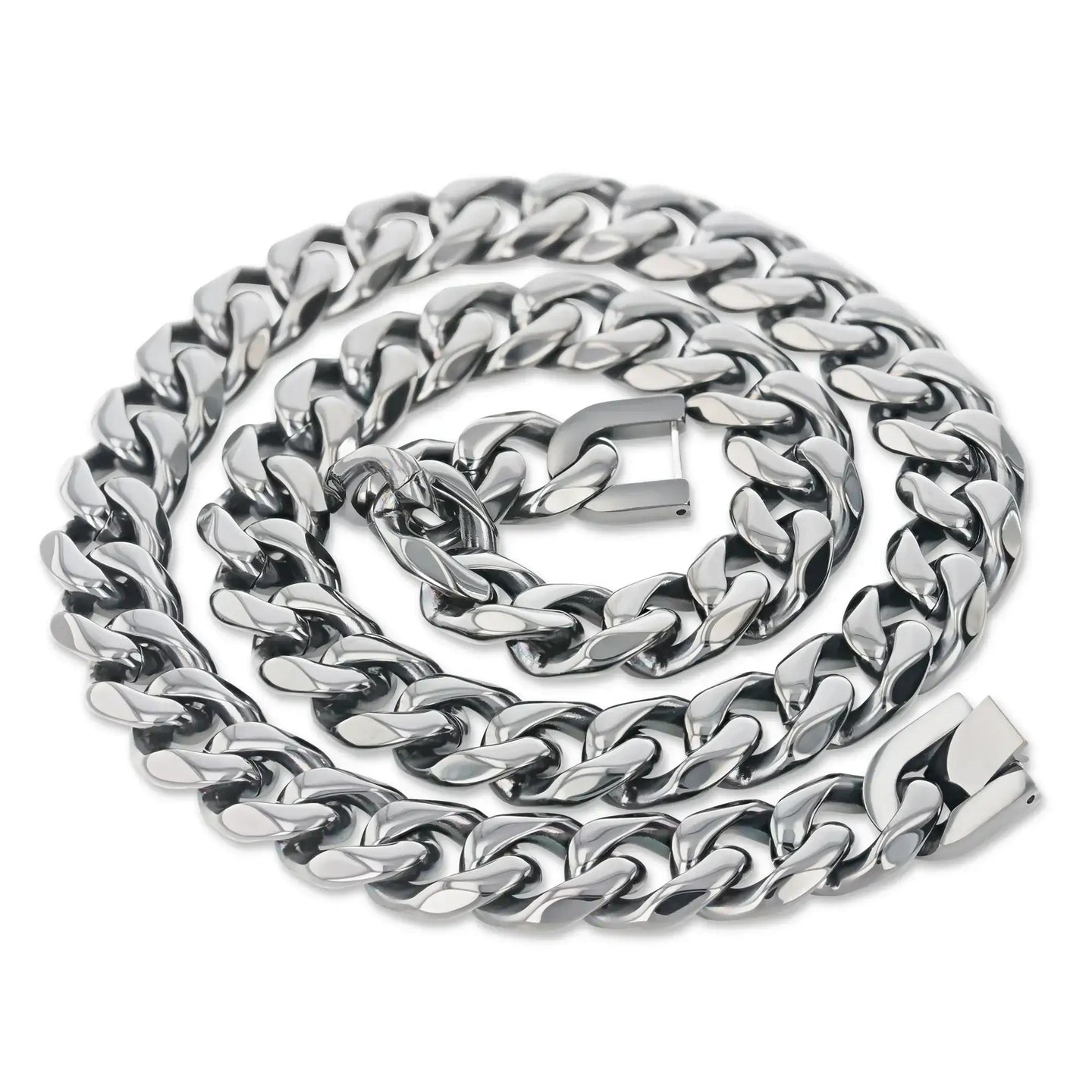 Close-up of a polished stainless steel Cuban link chain coiled with a box-style clasp visible