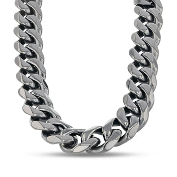 Front view of a thick stainless steel 14mm Cuban link chain showing the links’ shine