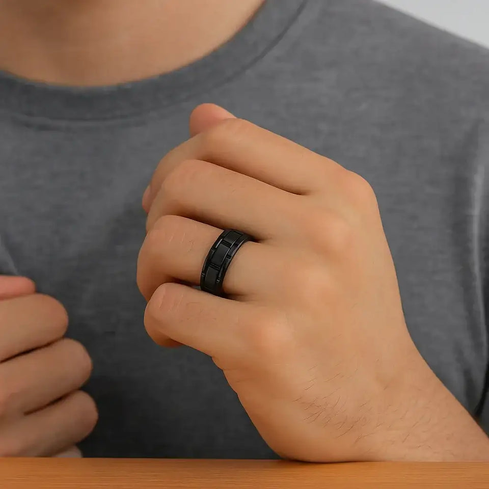 Top-down view of the WINDSOR black tungsten carbide band highlighting the alternating groove pattern