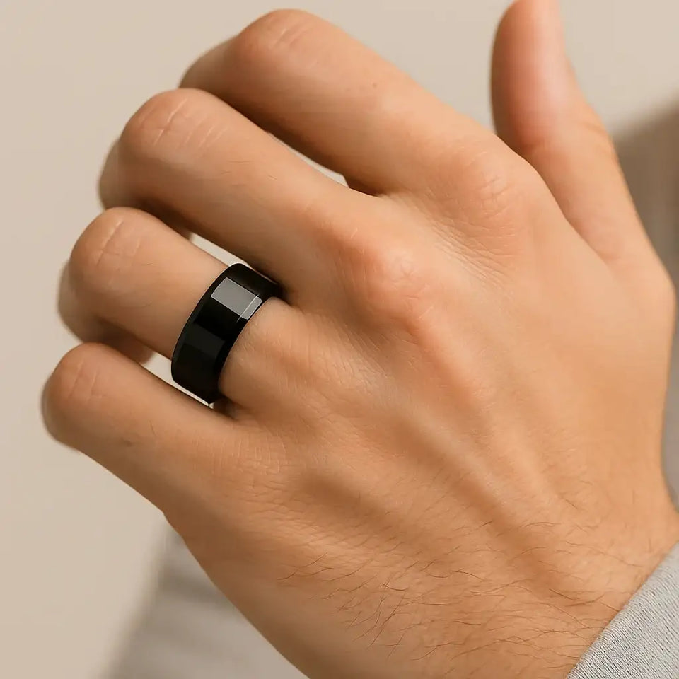 CITAR polished black ceramic ring with beveled edges, 10mm width, shown on hand