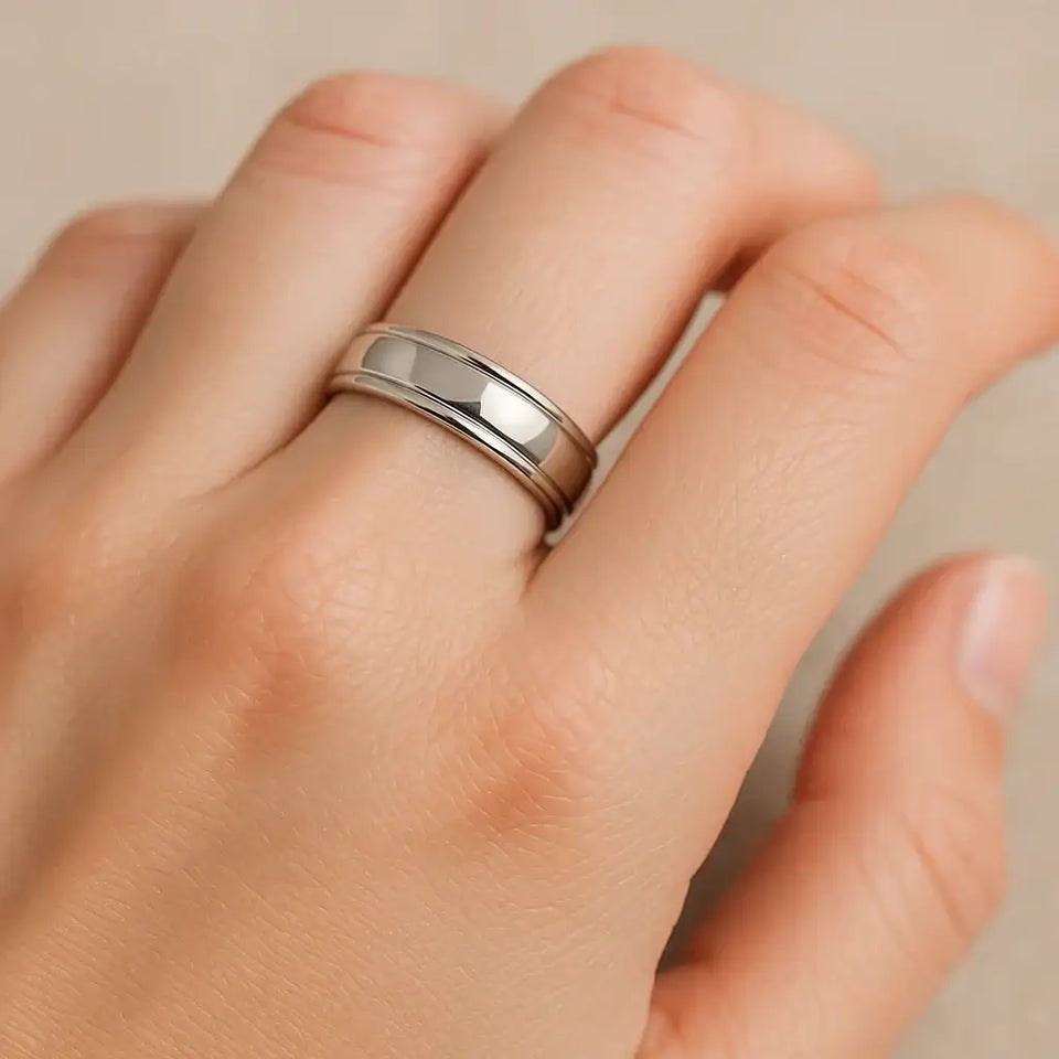 HARRISON 14k white gold domed wedding band with rolled edges shown on hand, 6 mm width