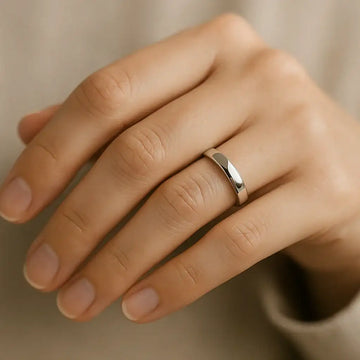 High-polished 3mm cobalt wedding band worn on a hand to show fit
