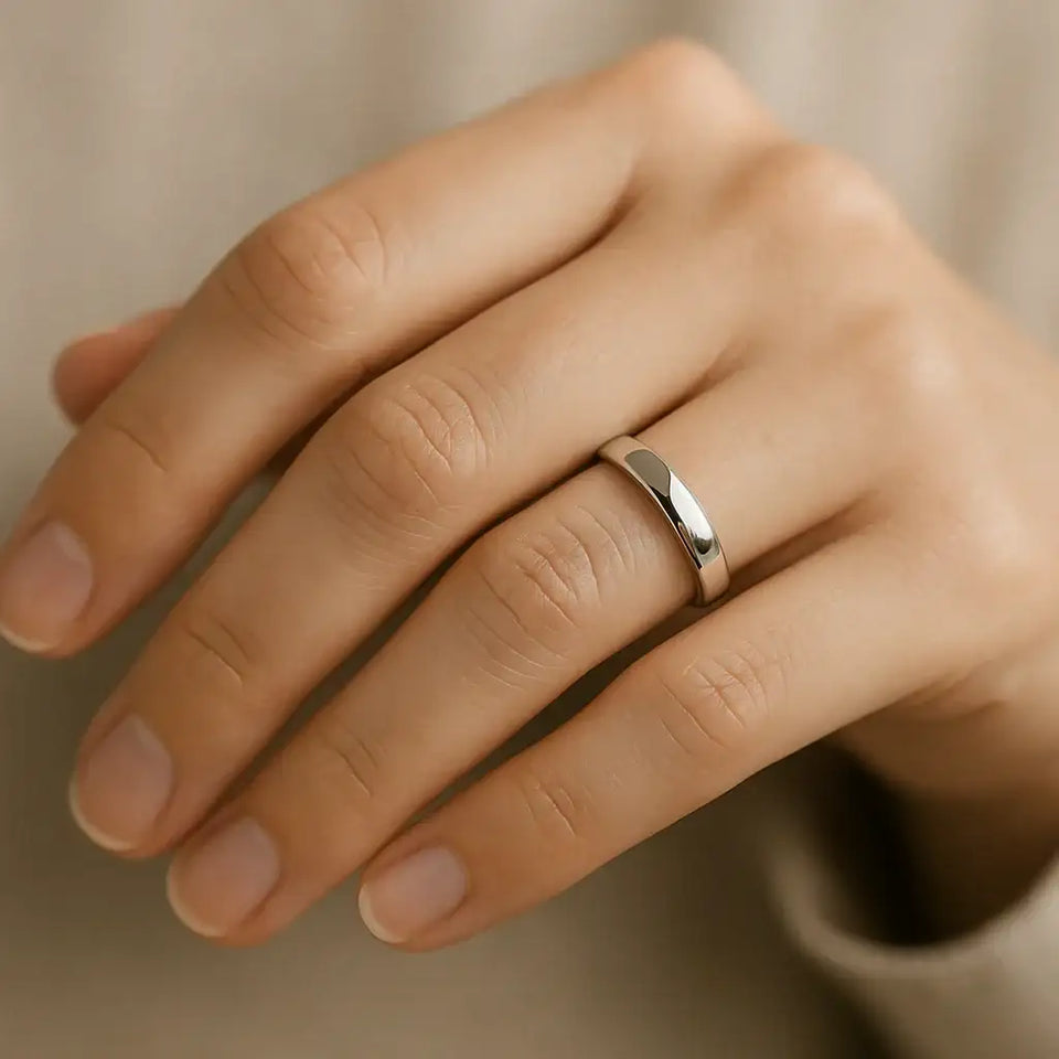 High-polished 3mm cobalt wedding band worn on a hand to show fit