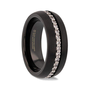 Side view of an 8mm domed black tungsten carbide ring with a brushed finish and a channel of round white sapphires.