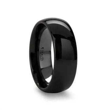 Wide domed black ceramic ring with high-polish finish and Thorsten logo inside