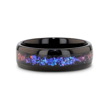 COSMIC black tungsten ring, flat-lay showing polished black finish and multicolor crushed inlay