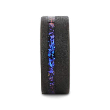 Front view of the sandblasted black tungsten ring showing the narrow central inlay of crushed alexandrite and blue-purple goldstone