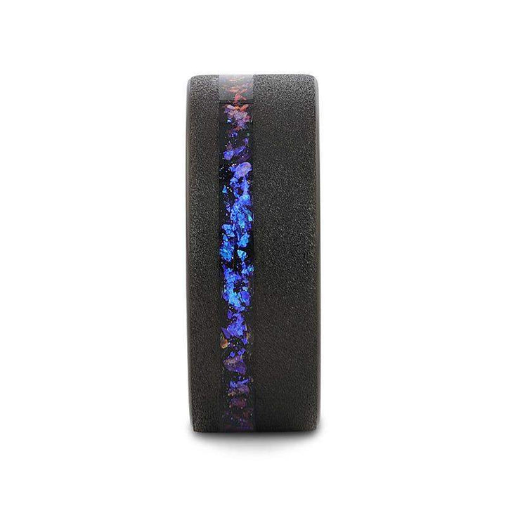 Front view of the sandblasted black tungsten ring showing the narrow central inlay of crushed alexandrite and blue-purple goldstone