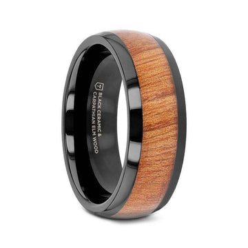 Angled view of an 8mm black ceramic ring with a domed polished finish and Carpathian elm wood inlay