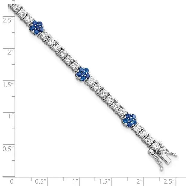 Sterling Silver Rhodium-plated Cr Blue Spinel & CZ Flower 7in Bracelet - Larson Jewelers