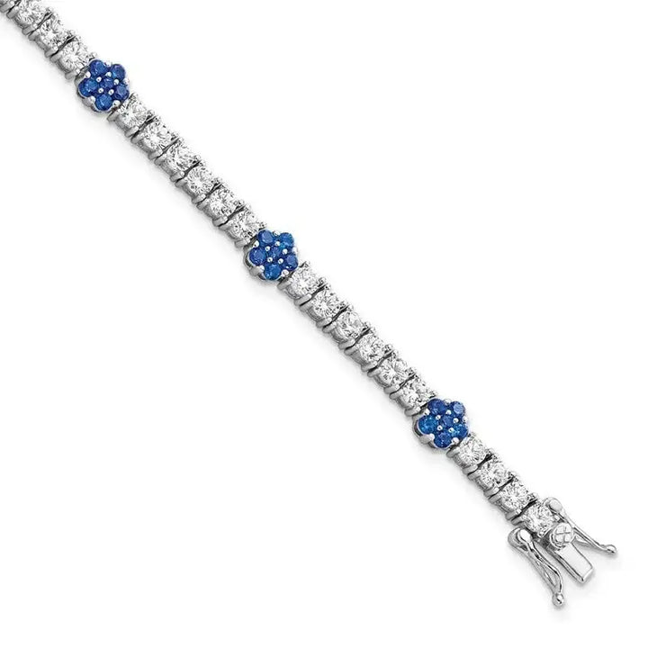 Sterling Silver Rhodium-plated Cr Blue Spinel & CZ Flower 7in Bracelet - Larson Jewelers