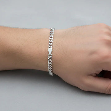 Sterling Silver Rhodium-plated 4mm Domed w/ Side D/C Curb Chain Bracelet - Larson Jewelers