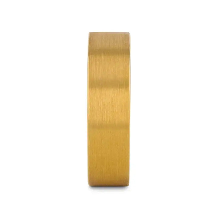 Angled view of the narrower flat brushed gold-plated tungsten carbide ring with marked interior.