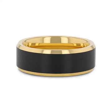 Side view of the ring laying flat, highlighting polished gold beveled edges and black brushed center