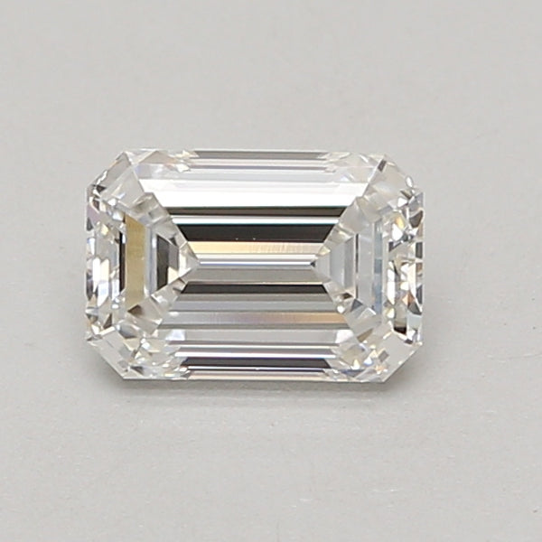 Emerald-cut lab-grown diamond loose stone with faceted surfaces and clear appearance on neutral background.