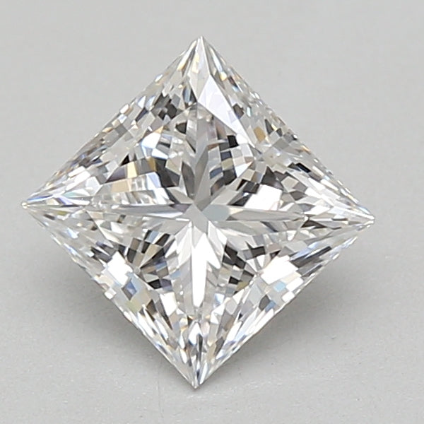 Princess cut loose diamond with faceted surface and sharp corners, displaying light refraction and reflections.