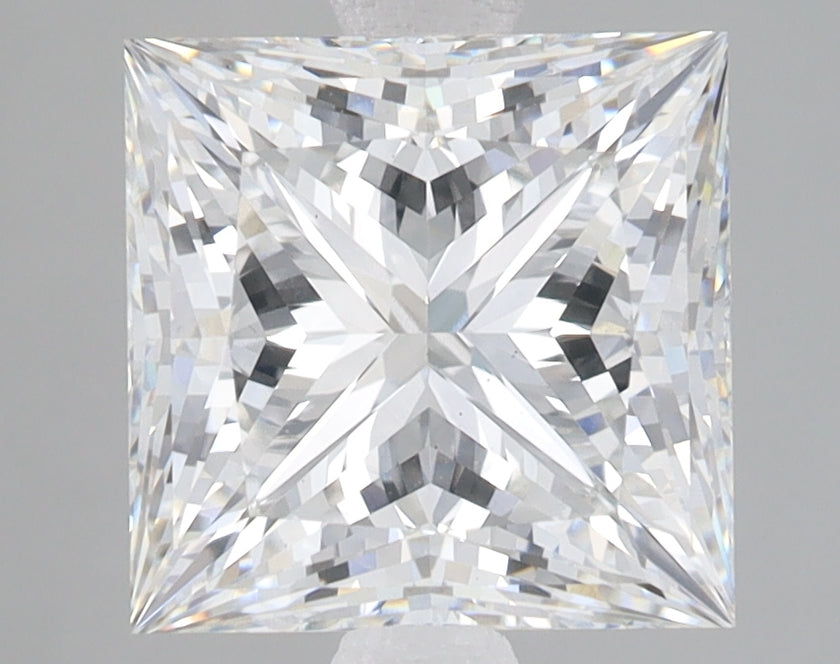 Princess cut lab grown diamond with faceted surface displaying light refraction patterns, viewed from above.