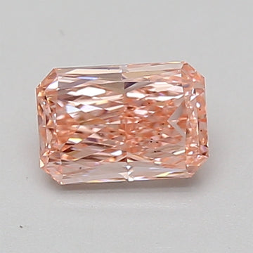 Radiant cut lab-grown diamond with peachy-pink hue and faceted surface on neutral background.