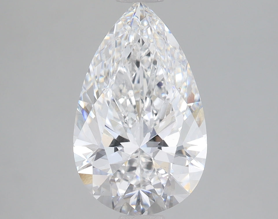 Pear-shaped lab-grown diamond with faceted surface and clear brilliance on gray background.