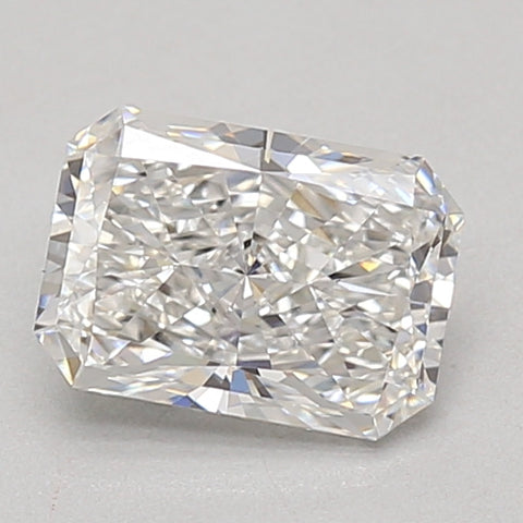 Radiant cut lab-grown diamond with clear faceting and light refraction, displayed against neutral background.