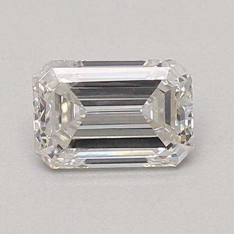 Emerald-cut lab-grown diamond with clear facets and reflective surfaces, displayed on neutral background.