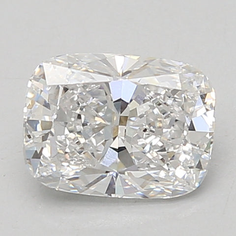 Cushion cut lab-grown diamond with faceted surface and light reflections on neutral background.