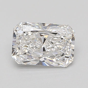 Radiant cut loose diamond with faceted surfaces reflecting light, displayed against a neutral gray background.