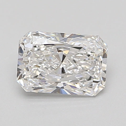 Radiant cut loose diamond with faceted surfaces reflecting light, displayed against a neutral gray background.