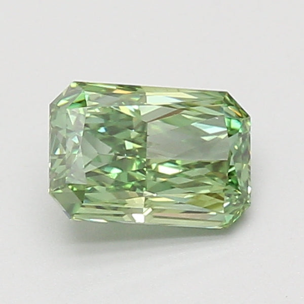 Light green radiant cut loose diamond with faceted surfaces and reflective clarity on white background.