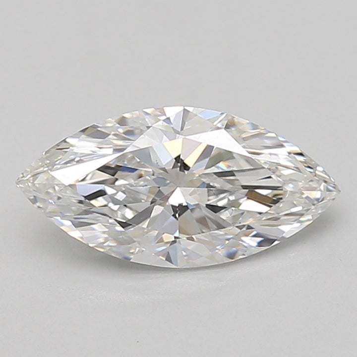 Marquise-cut lab-grown diamond with faceted surface, displaying light refraction and clarity against neutral background.