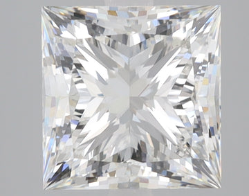 Princess-cut lab-grown diamond with faceted surface reflecting light, displaying clear crystalline structure.
