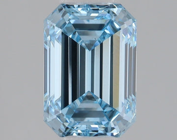 Light blue rectangular emerald cut lab grown diamond with faceted edges and reflective surfaces on neutral background.