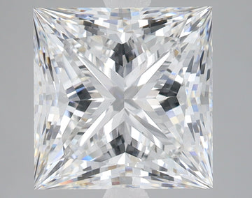 Princess-cut lab-grown diamond with faceted surface displaying light refraction and sparkle against neutral background.