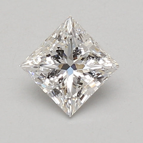 Princess-cut lab-grown diamond loose stone with faceted surfaces and light reflections on neutral background.