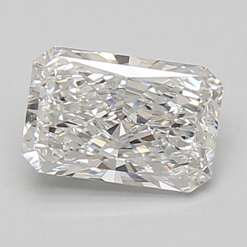 Radiant cut loose diamond with faceted surface and light reflections on neutral background.