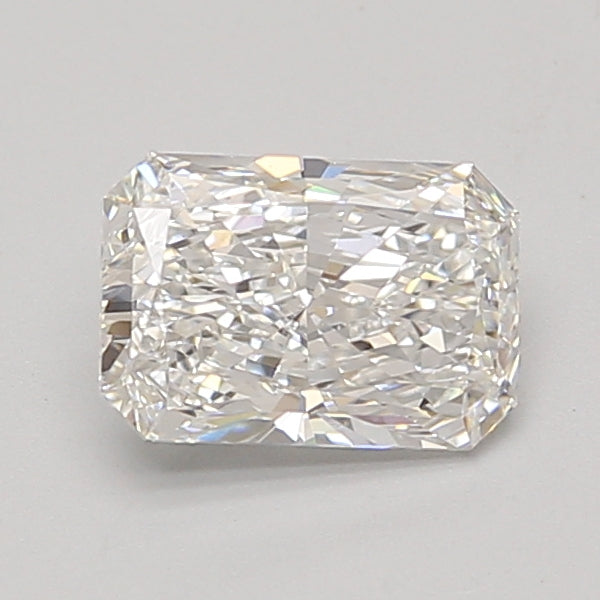 Radiant cut loose diamond with faceted surface and light reflections on neutral background.