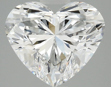 Heart-shaped colorless diamond with faceted surfaces and light reflections on neutral background.