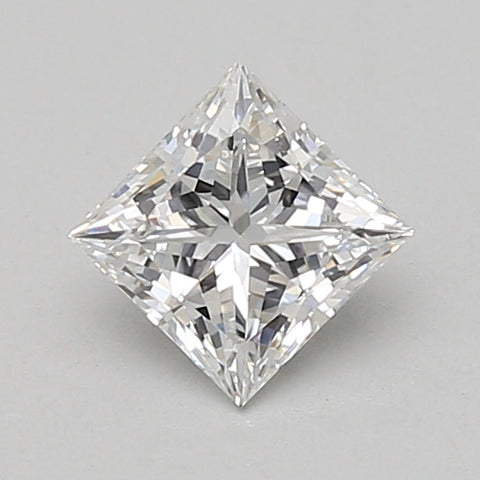 Clear princess-cut diamond with pointed corners and faceted surface reflecting light.