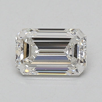 Clear emerald-cut diamond with faceted edges and step-cut pavilion, displayed against neutral background.