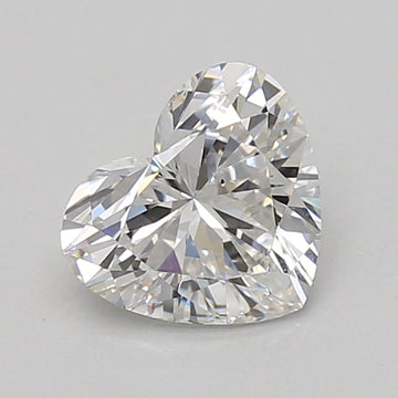 Heart-shaped lab-grown diamond loose stone with faceted surface, displaying light reflections.
