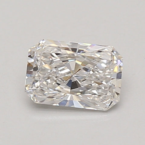 Radiant cut lab-grown diamond with faceted surface, showing light refraction and reflections on neutral background.