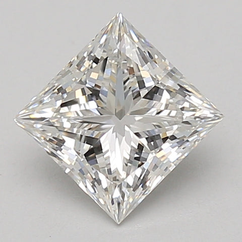 Princess cut lab-grown diamond with faceted surface and pointed corners, displayed on neutral background.