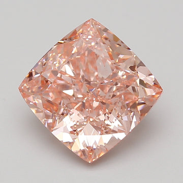 Cushion-cut lab-grown diamond with peachy-pink hue displaying faceted surface and light reflections.