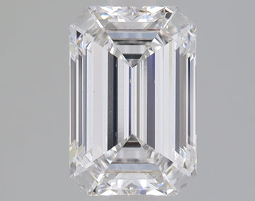 Emerald-cut lab-grown diamond loose stone with faceted surfaces and clear transparency displayed against gray background.